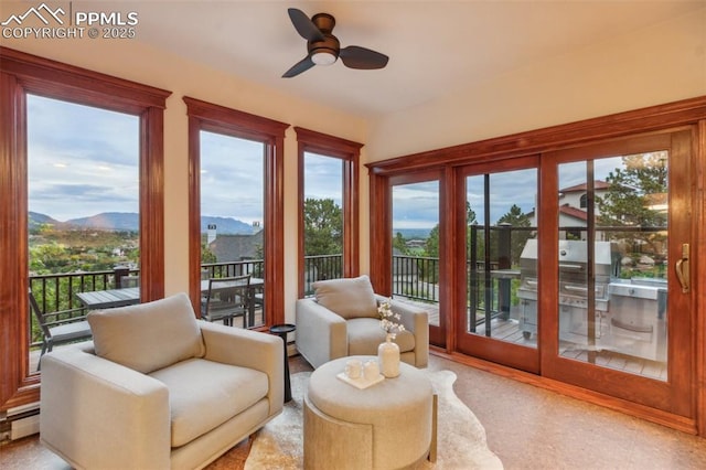 170 Salisbury Ct, Colorado Springs, CO 80906 - sunroom featuring a mountain view and a baseboard radiator