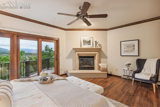 170 Salisbury Ct, Colorado Springs, CO 80906 - bedroom featuring access to outside, baseboards, wood finished floors, crown molding, and a glass covered fireplace