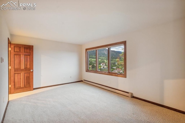 170 Salisbury Ct, Colorado Springs, CO 80906 - spare room featuring baseboard heating, carpet floors, and baseboards