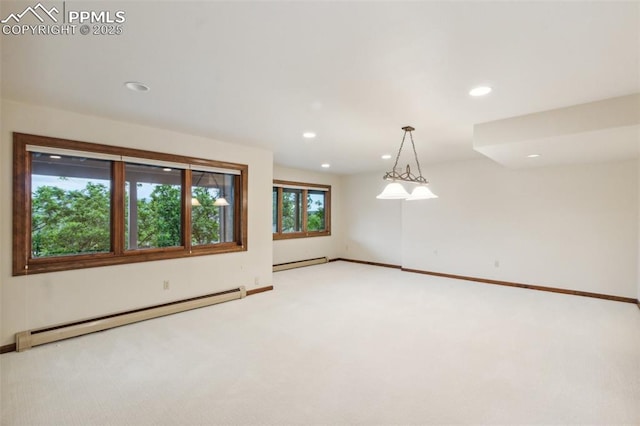 170 Salisbury Ct, Colorado Springs, CO 80906 - unfurnished room with a baseboard heating unit, light colored carpet, recessed lighting, and baseboards
