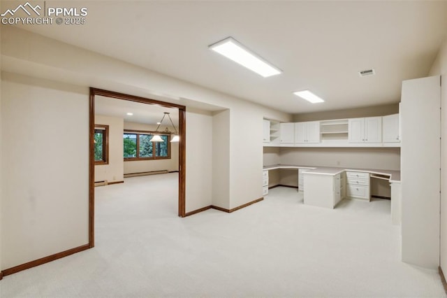 170 Salisbury Ct, Colorado Springs, CO 80906 - unfurnished office with light colored carpet, baseboards, and a baseboard heating unit
