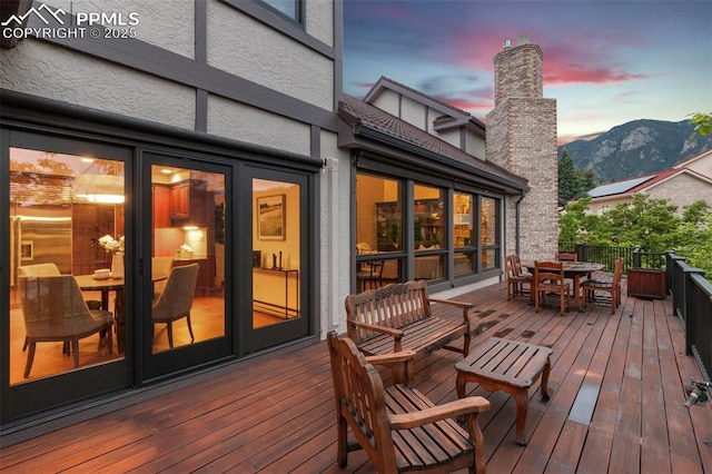 170 Salisbury Ct, Colorado Springs, CO 80906 - wooden terrace with outdoor dining area and a mountain view