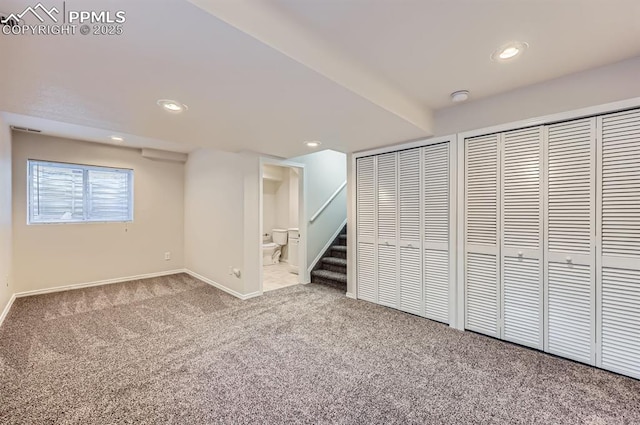 869 Marshall Dr, Fountain, CO 80817 - below grade area featuring carpet floors, stairway, baseboards, and recessed lighting