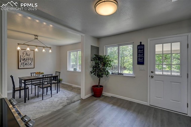 1135 Server Dr, Colorado Springs, CO 80910 - dining space featuring wood finished floors and baseboards