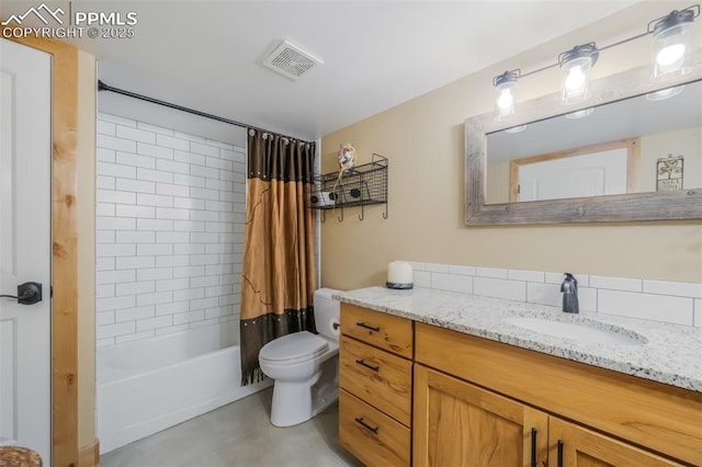 325 Spring Valley Dr, Florissant, CO 80816 - full bathroom featuring vanity, toilet, and shower / tub combo