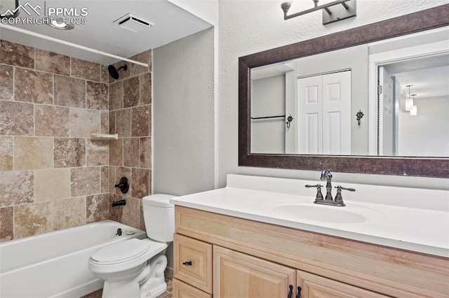 128 W Rockrimmon Blvd Unit 105, Colorado Springs, CO 80919 - full bathroom featuring vanity,  shower combination, and a textured wall