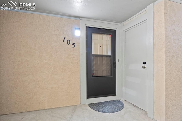 128 W Rockrimmon Blvd Unit 105, Colorado Springs, CO 80919 - property entrance featuring stucco siding