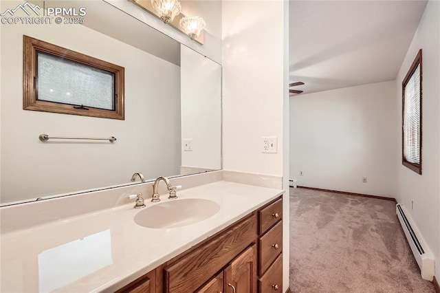 3660 E Wade Ln, Colorado Springs, CO 80917 - bathroom with a baseboard radiator, vanity, a baseboard heating unit, and baseboards