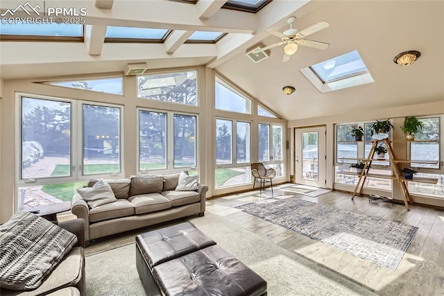 3660 E Wade Ln, Colorado Springs, CO 80917 - sunroom featuring a skylight and hardwood / wood-style floors