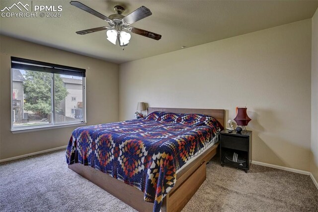 4959 Gami Way, Colorado Springs, CO 80911 - carpeted bedroom featuring baseboards and a ceiling fan