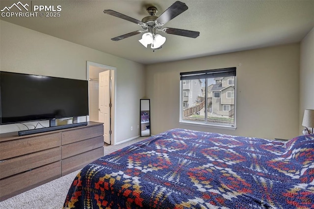 4959 Gami Way, Colorado Springs, CO 80911 - carpeted bedroom with baseboards and a ceiling fan