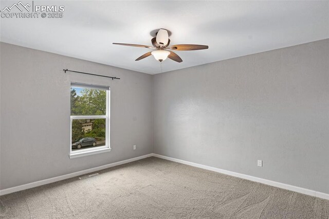4623 Ranch Cir, Colorado Springs, CO 80918 - spare room featuring a ceiling fan, carpet, and baseboards