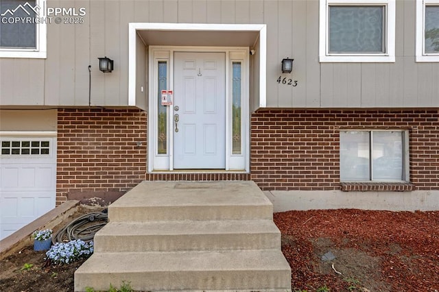 4623 Ranch Cir, Colorado Springs, CO 80918 - view of exterior entry with brick siding