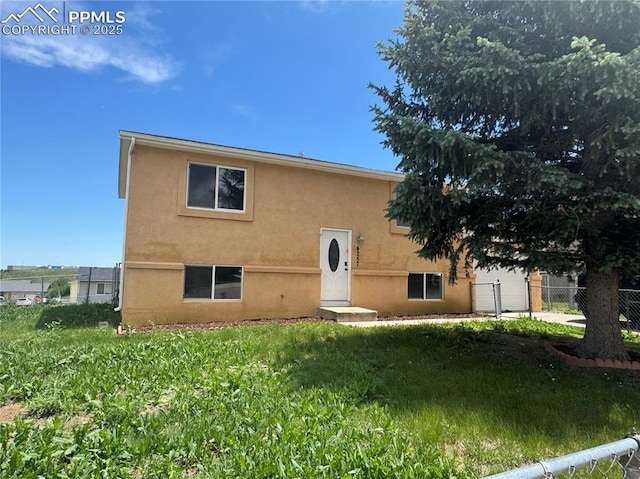 4257 Millburn St, Colorado Springs, CO 80906 - view of front facade with stucco siding
