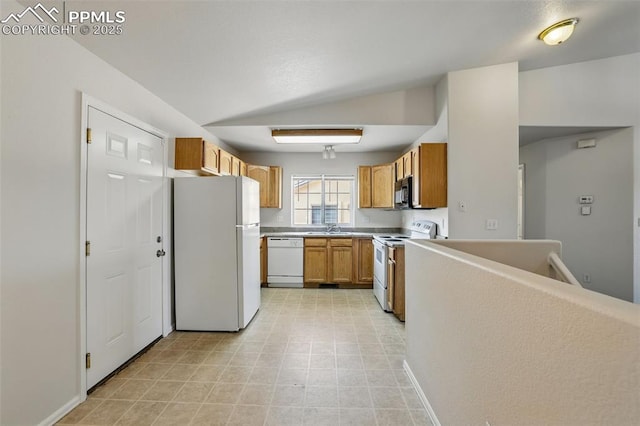 688 Bosque Vista Pt, Colorado Springs, CO 80916 - kitchen featuring white appliances, a sink, light countertops, and light floors