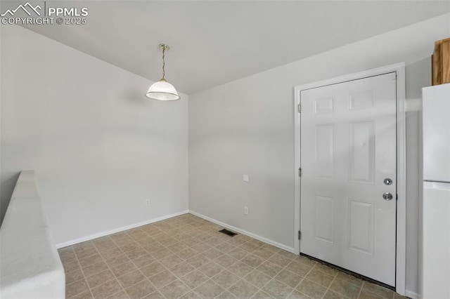 688 Bosque Vista Pt, Colorado Springs, CO 80916 - unfurnished dining area with baseboards and light floors