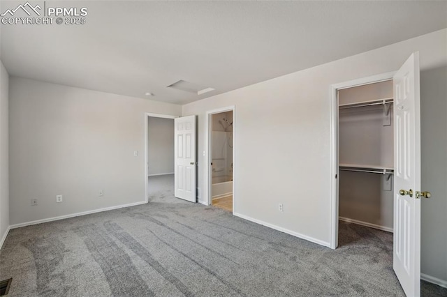 688 Bosque Vista Pt, Colorado Springs, CO 80916 - unfurnished bedroom with carpet, baseboards, a spacious closet, ensuite bathroom, and a closet