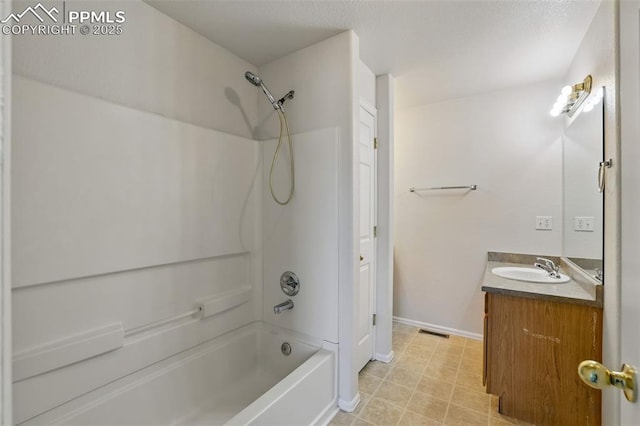 688 Bosque Vista Pt, Colorado Springs, CO 80916 - full bathroom featuring vanity, shower / bathtub combination, and baseboards