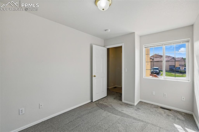 688 Bosque Vista Pt, Colorado Springs, CO 80916 - unfurnished bedroom featuring carpet flooring and baseboards