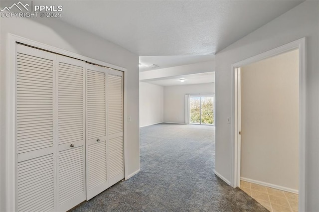 688 Bosque Vista Pt, Colorado Springs, CO 80916 - corridor featuring baseboards and carpet