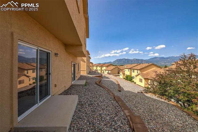 688 Bosque Vista Pt, Colorado Springs, CO 80916 - view of yard featuring a mountain view and a residential view