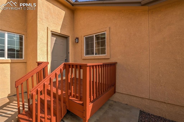 688 Bosque Vista Pt, Colorado Springs, CO 80916 - property entrance with stucco siding