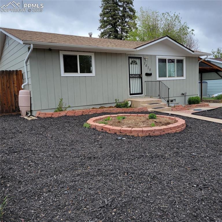 3410 E Bijou St, Colorado Springs, CO 80909 - ranch-style house featuring roof with shingles