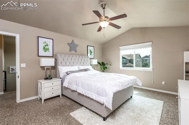6078 Jorie Rd, Colorado Springs, CO 80927 - carpeted bedroom with vaulted ceiling, baseboards, and a ceiling fan
