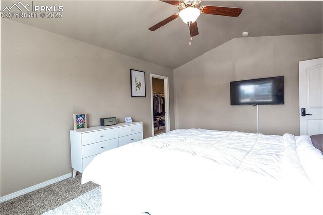 6078 Jorie Rd, Colorado Springs, CO 80927 - carpeted bedroom featuring lofted ceiling, baseboards, a spacious closet, a closet, and ceiling fan