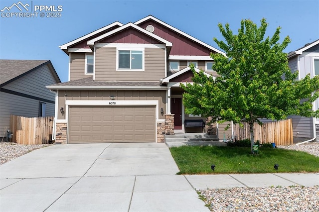 6078 Jorie Rd, Colorado Springs, CO 80927 - craftsman-style home featuring stone siding, a garage, concrete driveway, board and batten siding, and a shingled roof