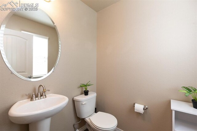 6078 Jorie Rd, Colorado Springs, CO 80927 - bathroom featuring a sink and toilet