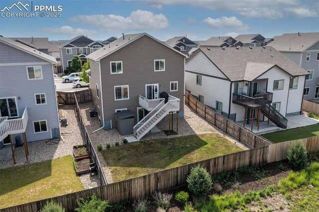 6078 Jorie Rd, Colorado Springs, CO 80927 - back of property with stairs, a residential view, and a deck