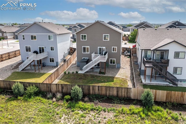 6078 Jorie Rd, Colorado Springs, CO 80927 - rear view of property with stairs, a fenced backyard, a residential view, and a deck