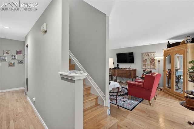 686 Echo Ln, Colorado Springs, CO 80904 - stairway with wood finished floors and baseboards