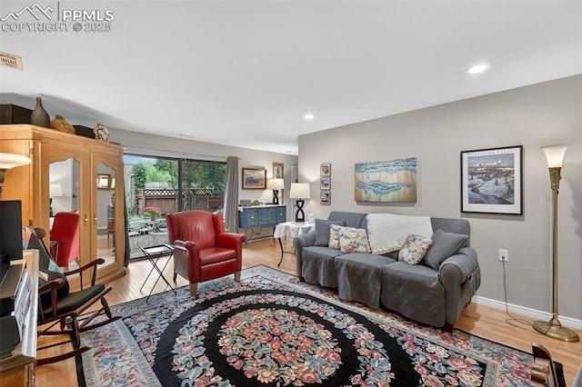 686 Echo Ln, Colorado Springs, CO 80904 - living room featuring light wood-type flooring and recessed lighting