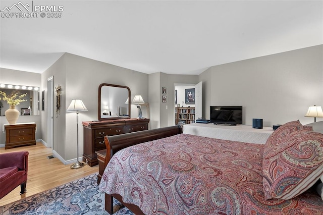 686 Echo Ln, Colorado Springs, CO 80904 - bedroom featuring wood finished floors and baseboards