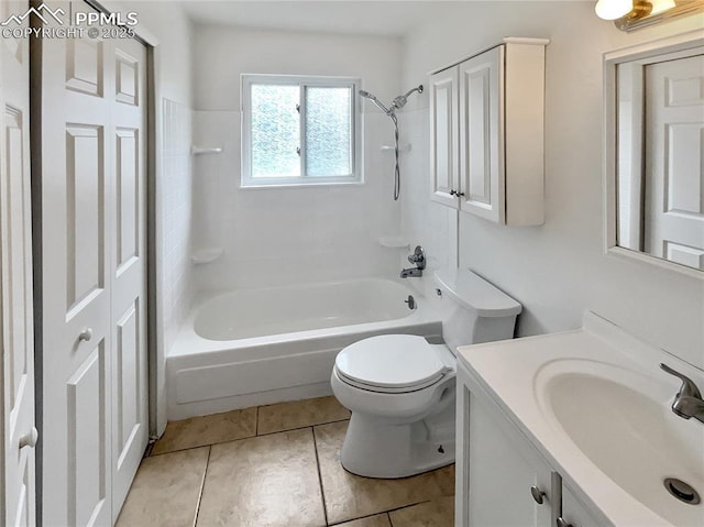1995 Hampton, Colorado Springs, CO 80906 - bathroom featuring vanity,  shower combination, toilet, tile patterned floors, and a closet