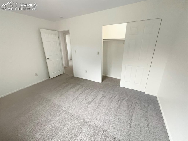 1995 Hampton, Colorado Springs, CO 80906 - unfurnished bedroom with carpet floors, baseboards, and a closet