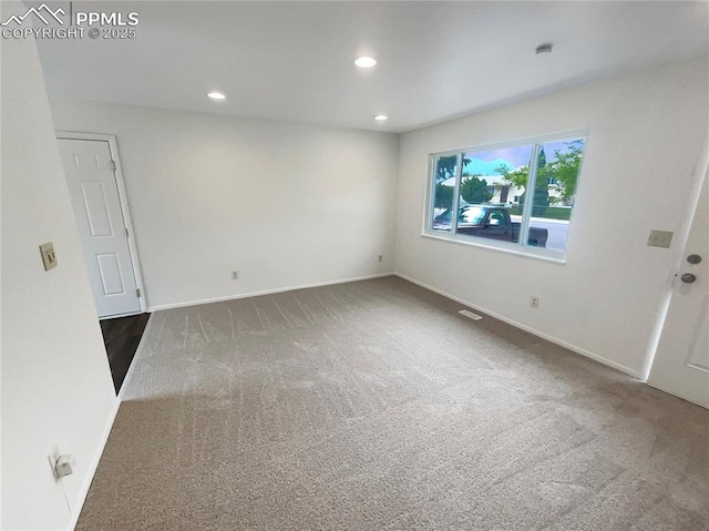 1995 Hampton, Colorado Springs, CO 80906 - spare room with carpet, recessed lighting, baseboards, and a smoke detector