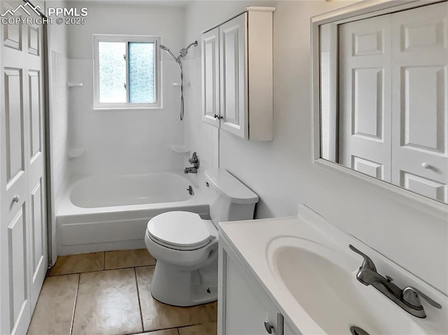 1995 Hampton, Colorado Springs, CO 80906 - bathroom with vanity, bathtub / shower combination, toilet, and tile patterned flooring