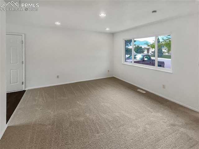 1995 Hampton, Colorado Springs, CO 80906 - spare room with carpet flooring, baseboards, and recessed lighting