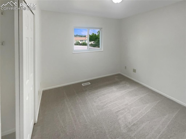 1995 Hampton, Colorado Springs, CO 80906 - unfurnished bedroom with carpet and baseboards