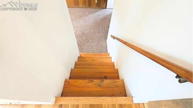 2204 Glenn Summer Rd, Colorado Springs, CO 80909 - stairs featuring carpet