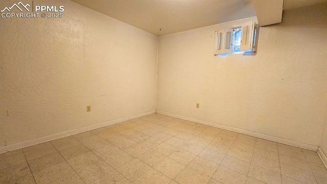2204 Glenn Summer Rd, Colorado Springs, CO 80909 - unfurnished room with tile patterned floors and baseboards