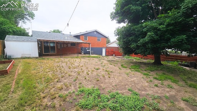 2204 Glenn Summer Rd, Colorado Springs, CO 80909 - view of yard with a patio and a garden