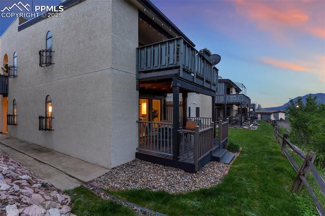 942 Fontmore Rd Unit B, Colorado Springs, CO 80904 - view of property exterior with a balcony and stucco siding