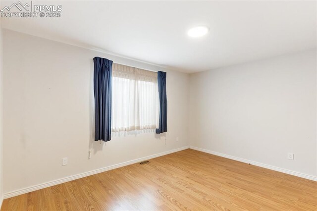942 Fontmore Rd Unit B, Colorado Springs, CO 80904 - spare room with light wood finished floors and baseboards
