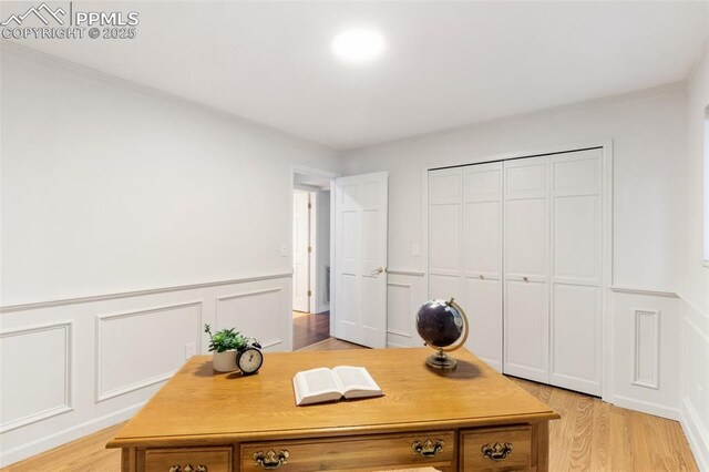 942 Fontmore Rd Unit B, Colorado Springs, CO 80904 - office space featuring light wood finished floors, a decorative wall, a wainscoted wall, and ornamental molding