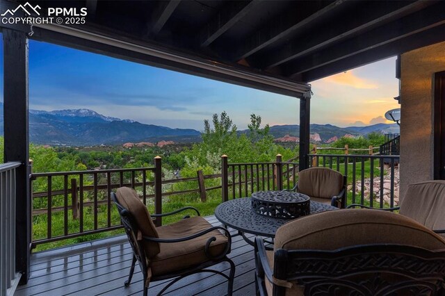 942 Fontmore Rd Unit B, Colorado Springs, CO 80904 - deck at dusk featuring a mountain view