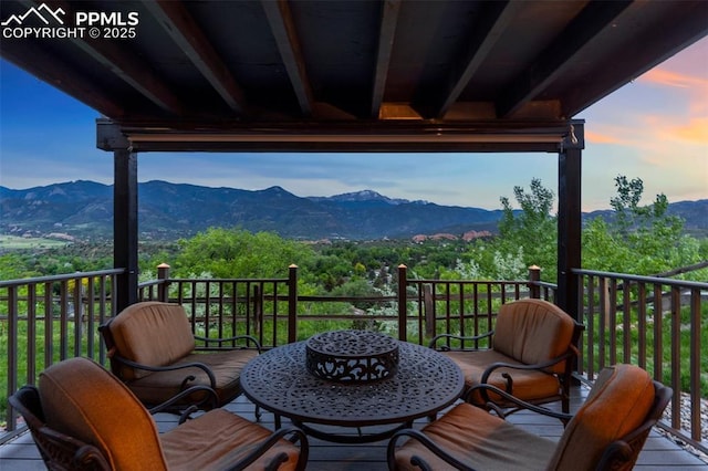 942 Fontmore Rd Unit B, Colorado Springs, CO 80904 - deck at dusk with a mountain view